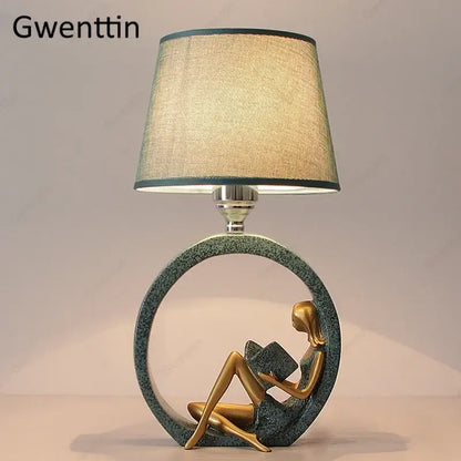 Gwenttin decorbites guitar girl table lamp with gold sculptural base teal ring and beige linen shade for reading light