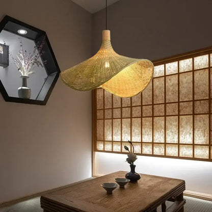 Golden woven bamboo pendant light with wooden top in hand knitted chinese style by decorbites for elegant lighting