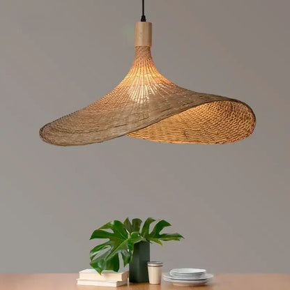 A warm-toned hand knitted chinese style rattan pendant light with natural wood accent by DecorBites™