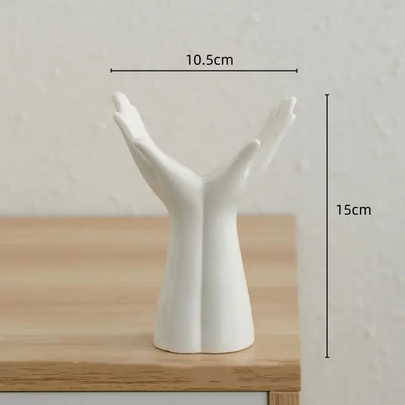 White ceramic hand arm palm sculpture forming v-shape vase by decorbites hand-painted flower vase decor