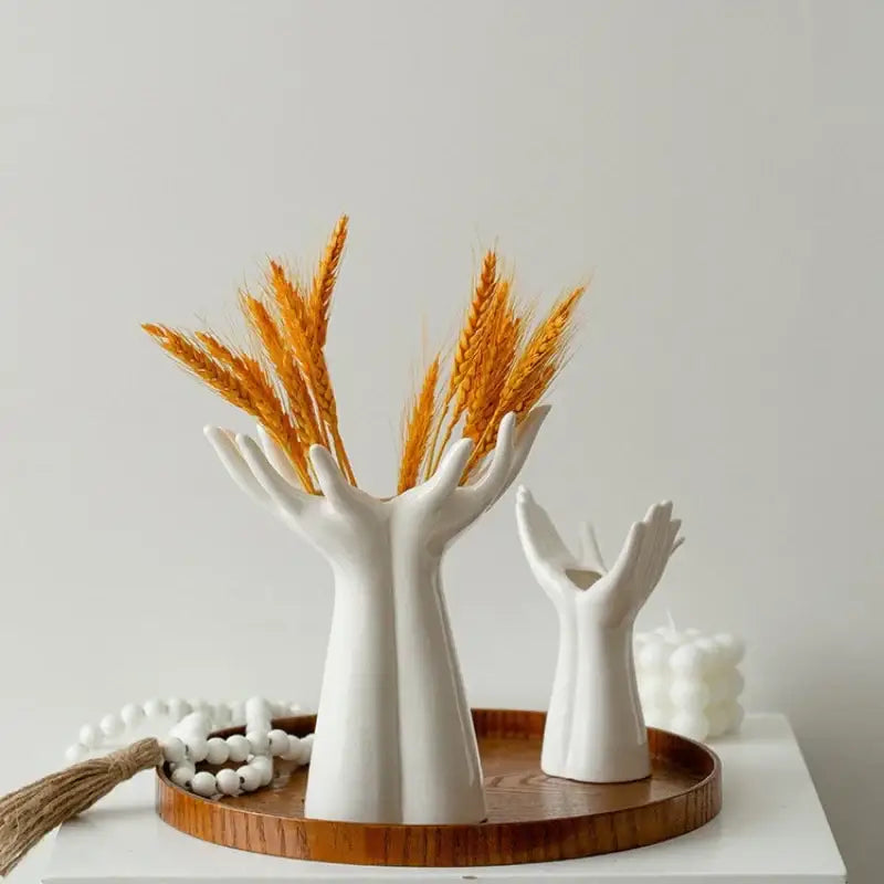 Decorbites™ hand-painted white ceramic hand arm palm vase holding golden wheat stalks for home decor