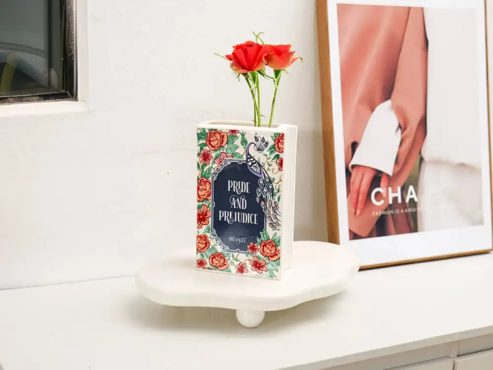Decorbites™ hand-painted white ceramic vase resembling a book with vibrant floral patterns for home decor