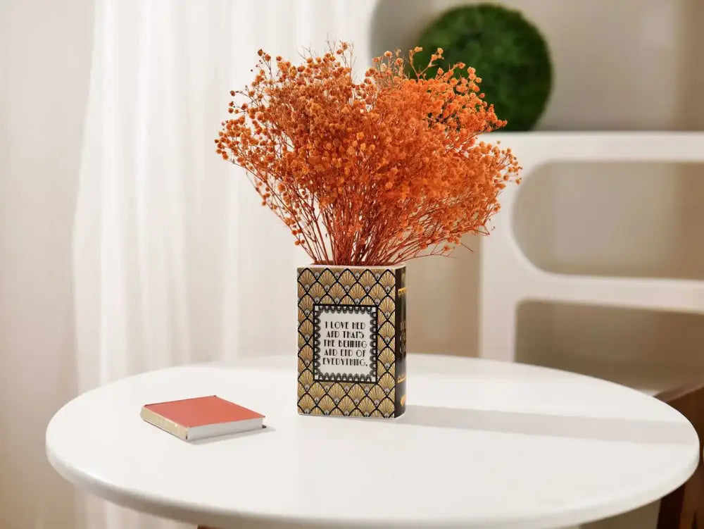 DecorBites™ hand-painted ceramic vase with black and gold geometric pattern and white text for home decor