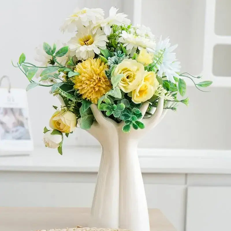 DecorBites™ white porcelain hand shaped flower vase with yellow and white artificial flowers for home decor