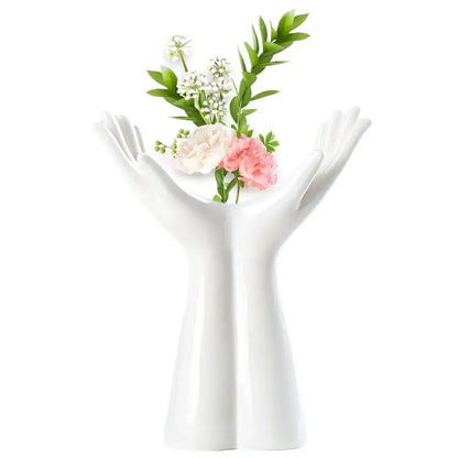 DecorBites™ hand shaped porcelain flower vase in white ceramic holding pink and white flowers for home decor