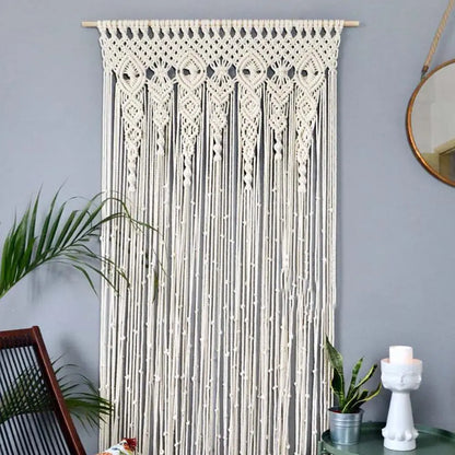 Cream-colored hand-woven decorbites™ macrame door curtain with intricate geometric patterns for home and wedding decor