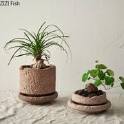 Two rustic handcrafted ceramic vases in terracotta with matching saucers for flowers by decorbites