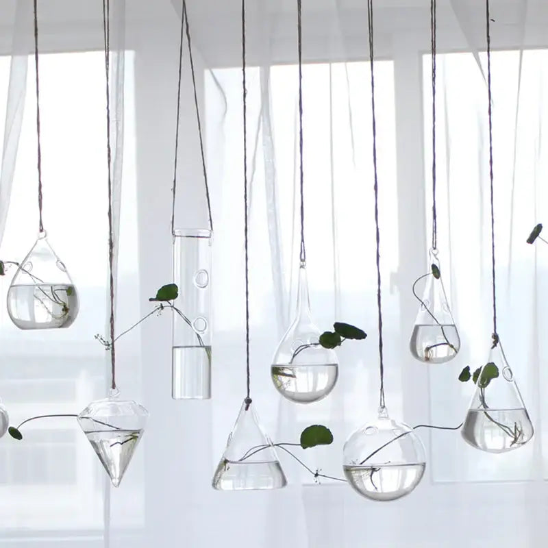 DecorBites handmade angel glass vase set of clear geometric hanging glass planters with green plants inside