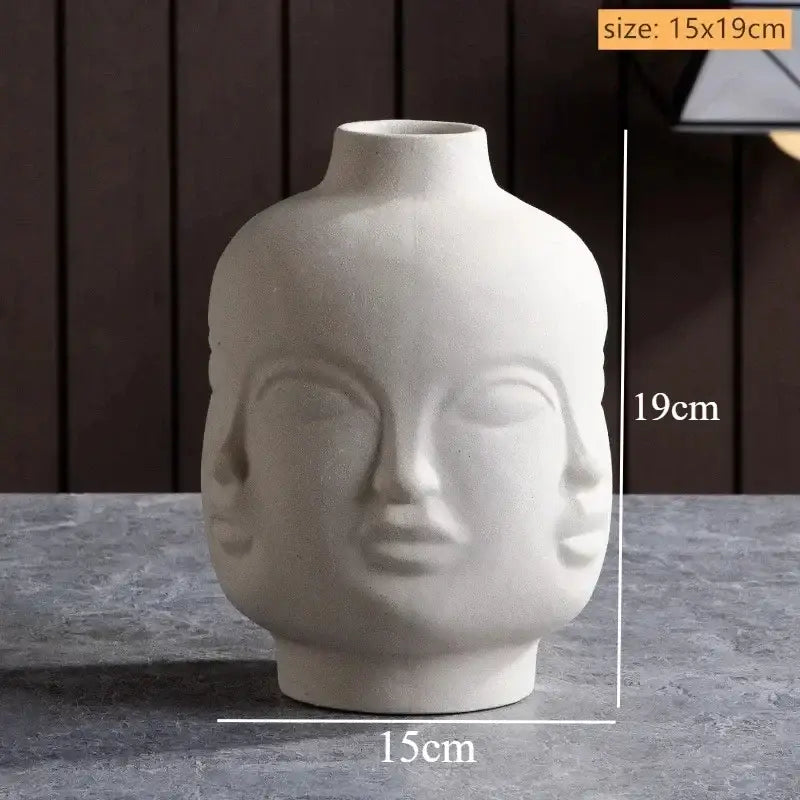 DecorBites™ handmade ceramic face white vase shaped like a serene buddha head for elegant home decor art vase sculpture