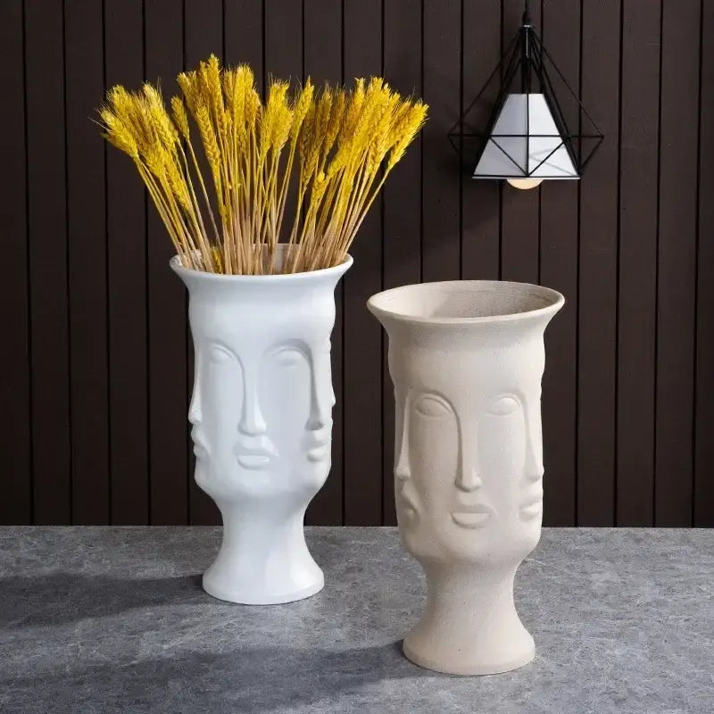 White handmade ceramic face vases with sculpted design and golden wheat stalks for elegant home decor art vase sculpture