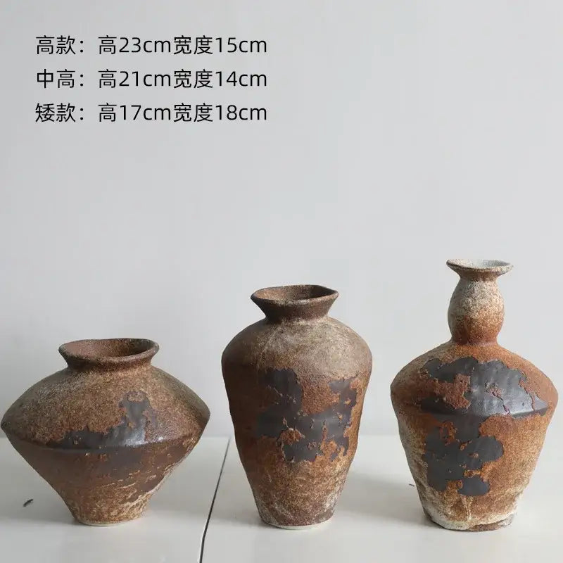 Three rustic handmade ceramic vases by decorbites with earthy brown and dark glaze patterns for zen flower arrangements