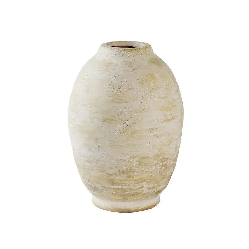 Cream-colored handmade ceramic vase with textured vintage finish and subtle beige streaks for home decor by DecorBites