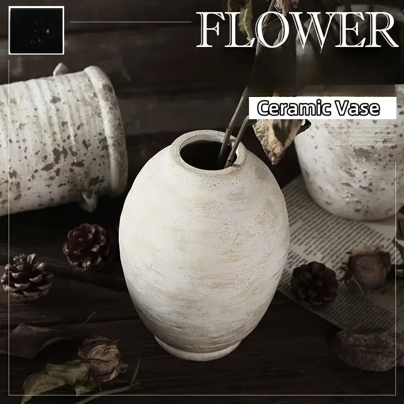 Decorbites™ handmade ceramic vases in rustic white with a textured speckled surface and rounded vintage style shape