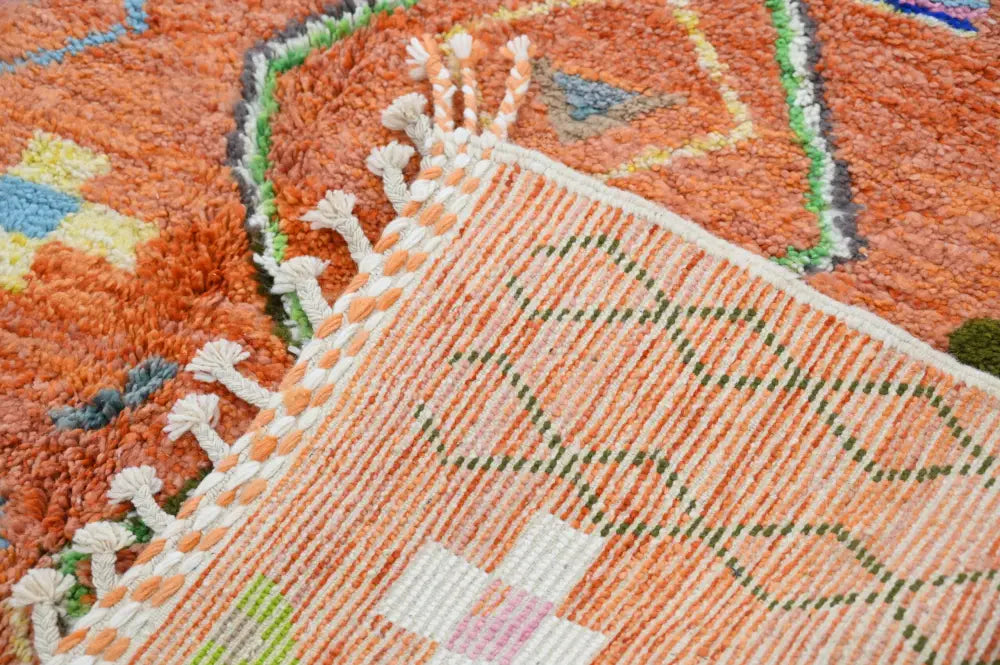 Orange moroccan decorbites™ handmade traditional azilal carpet with textured geometric patterns and fringed edges 305x205 cm