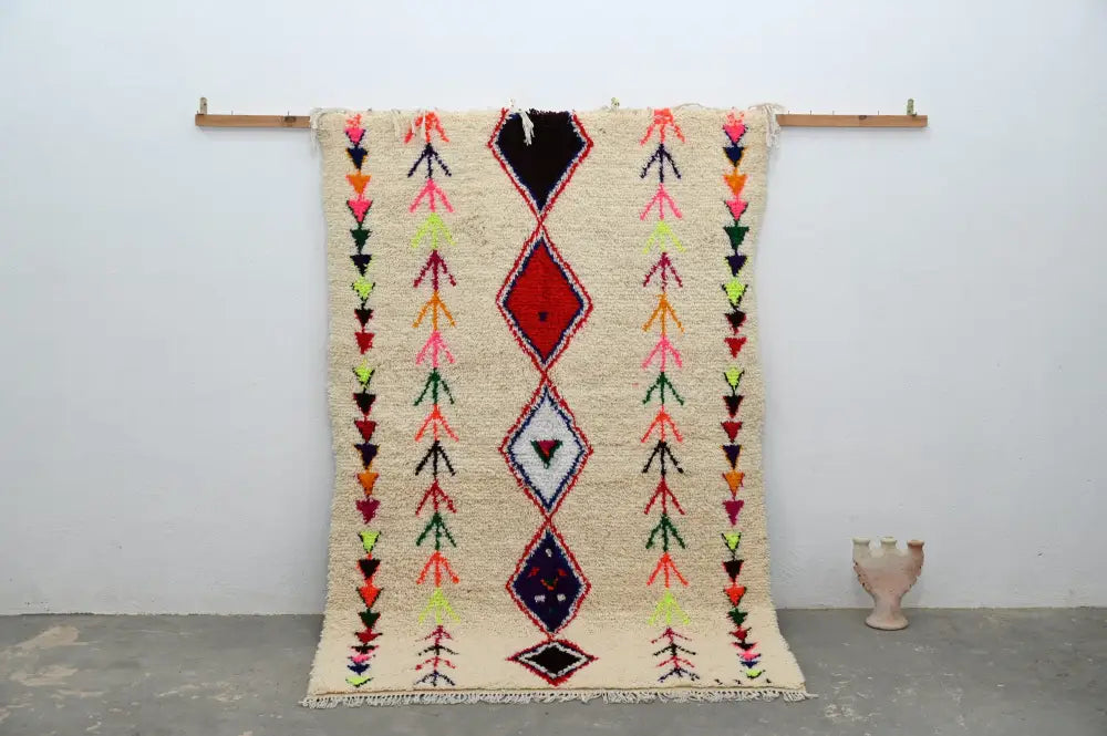 Beige DecorBites™ handmade moroccan azilal rug with bold red black blue and neon pink geometric patterns 231x152 cm
