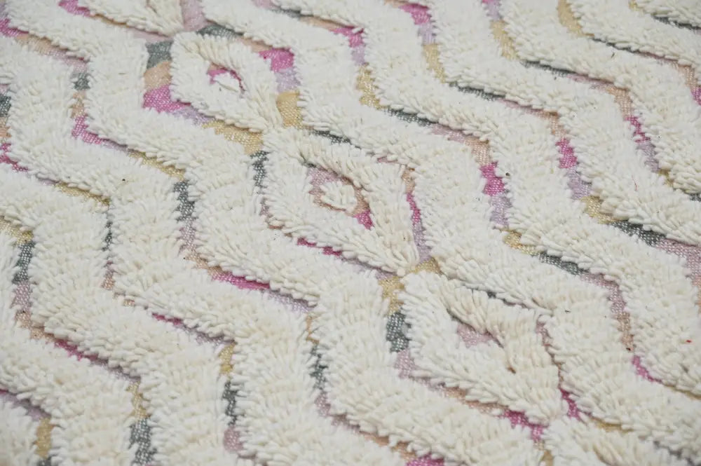 Decorbites handmade moroccan azilal rug 238x144cm with cream zigzag pattern and pink yellow thread accents