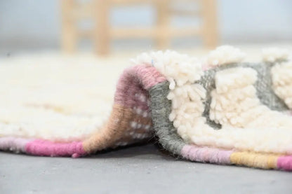 Decorbites handmade moroccan azilal rug cream wool with fluffy texture and colorful pink gray yellow striped border
