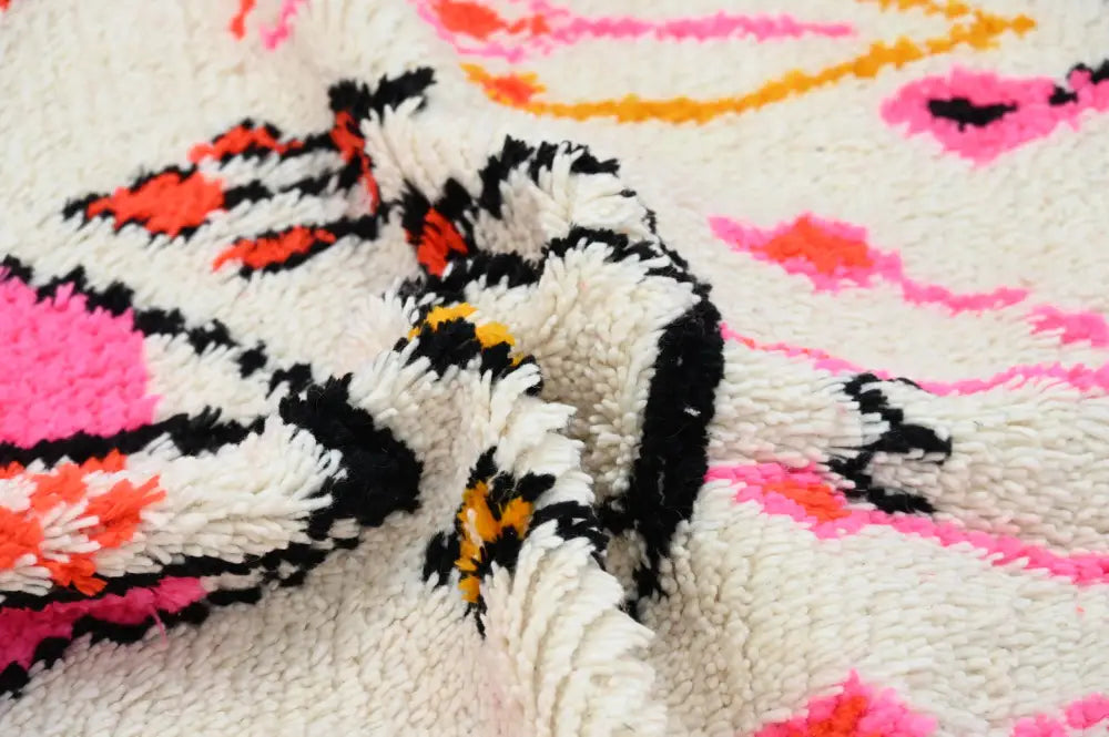Decorbites™ handmade moroccan azilal rug 245x141cm with plush cream base and vibrant pink black orange geometric patterns