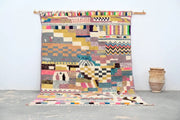 A vibrant moroccan handmade azilal rug with earthy tones and bright accents by decorbites 300x208 cm