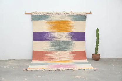 Colorful handmade moroccan azilal rug 302x197cm with horizontal stripes and textured fringed edges by decorbites