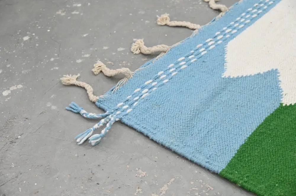 DecorBites™ handmade Moroccan azilal rug 305x204cm with geometric blue white green pattern and twisted natural fiber fringes