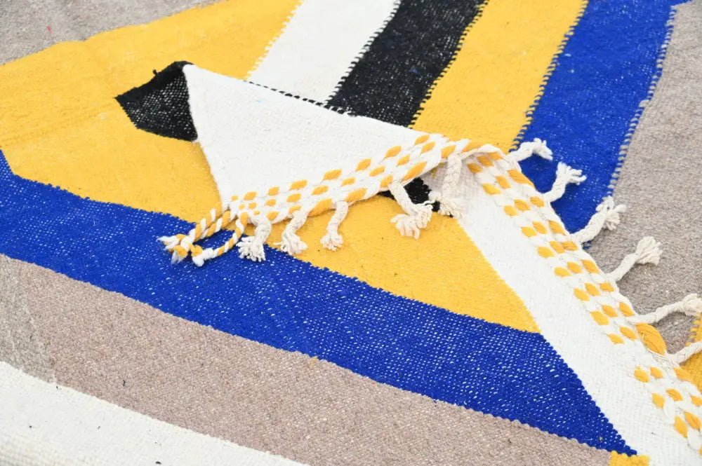 DecorBites™ handmade Moroccan azilal rug with vibrant yellow blue black and white stripes and fringed edge 306x196cm