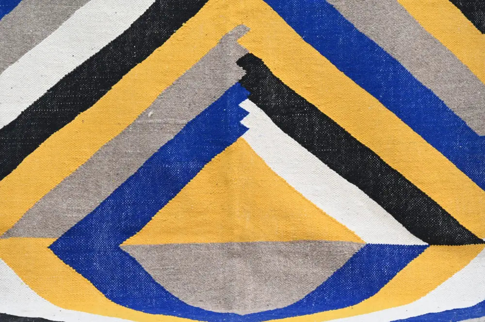Vibrant handmade moroccan azilal rug with bold diagonal stripes in yellow blue black white and gray 306x196cm