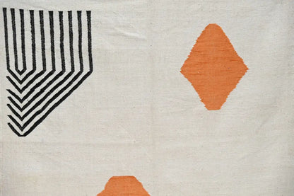 Cream-colored handmade moroccan azilal rug with bold black geometric stripes and orange diamond shapes 308x200 cm