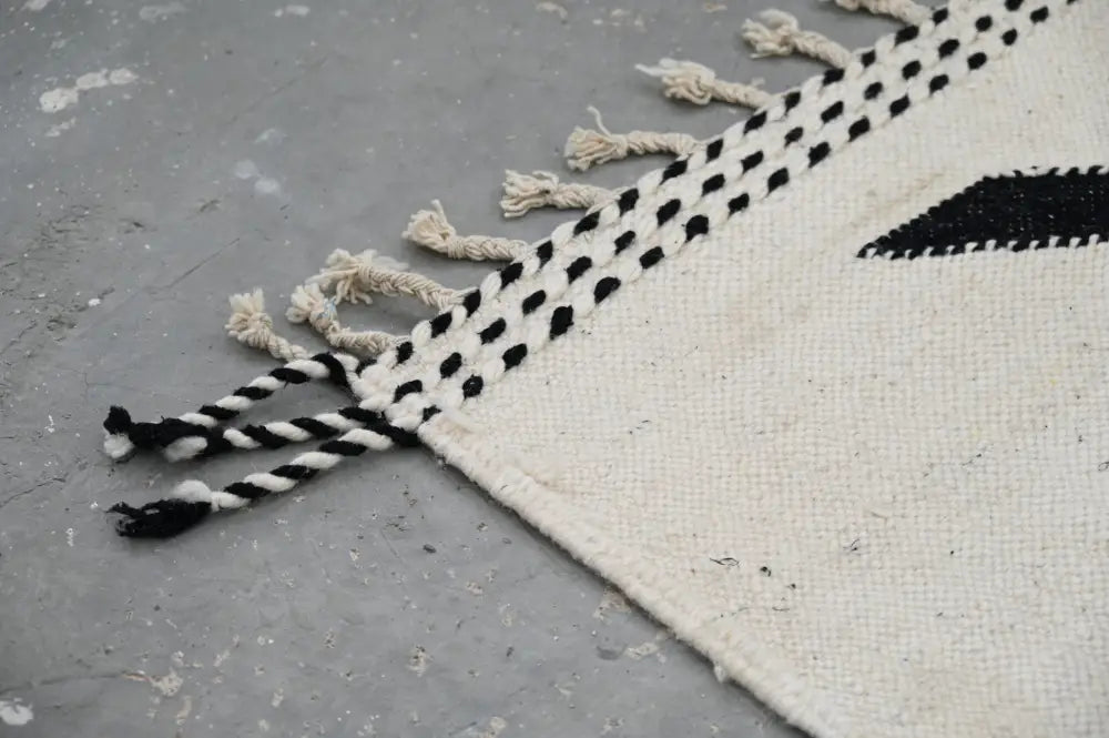 DecorBites handmade moroccan azilal rug 317x200 cm with black and white geometric pattern and fringed edges