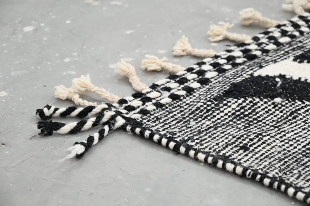 DecorBites™ handmade traditional azilal rug black and white woven with fringed edges 326x203 cm