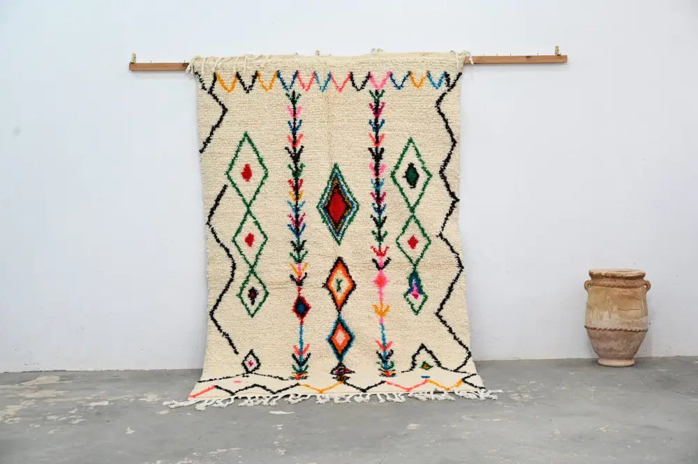Beige DecorBites™ handmade traditional azilal rug with colorful geometric patterns and fringed edges 240x150cm