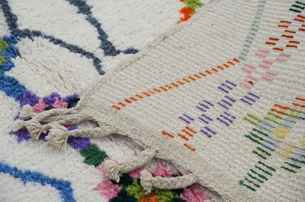Beige woven decorbites™ traditional azilal rug with colorful geometric patterns and fringed edges 315x194cm