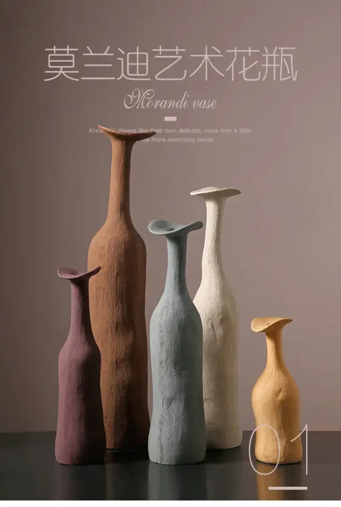 A set of five handcrafted earthy toned ceramic flower vases with unique textures and elongated necks by DecorBites™