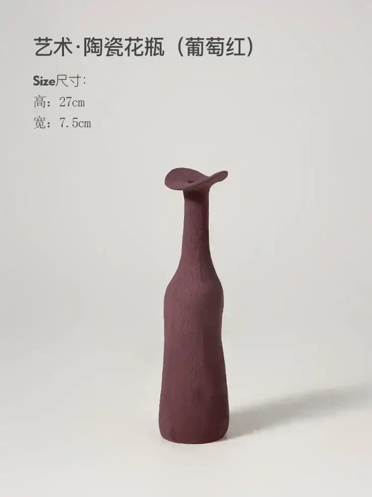 DecorBites™ handmade nordic burgundy ceramic flower vase with slender neck and smooth matte finish for luxury home