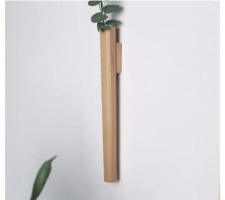 Minimalist light oak solid wood wall vase handmade Nordic design with sleek rectangular shape and vertical slot for plants