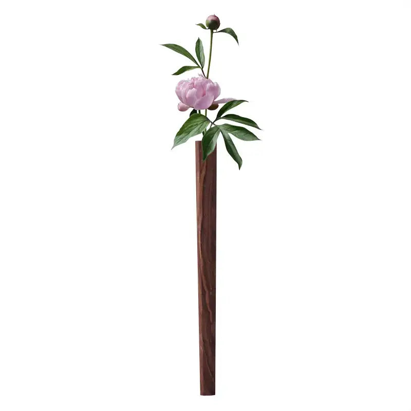 DecorBites™ handmade nordic solid wood wall vase in dark brown holds a pink peony flower and green leaves