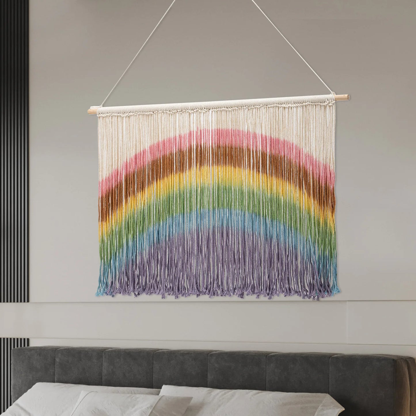 Colorful handmade weaving macrame wall hanging with rainbow stripes and wooden dowel for wall decor by decorbites