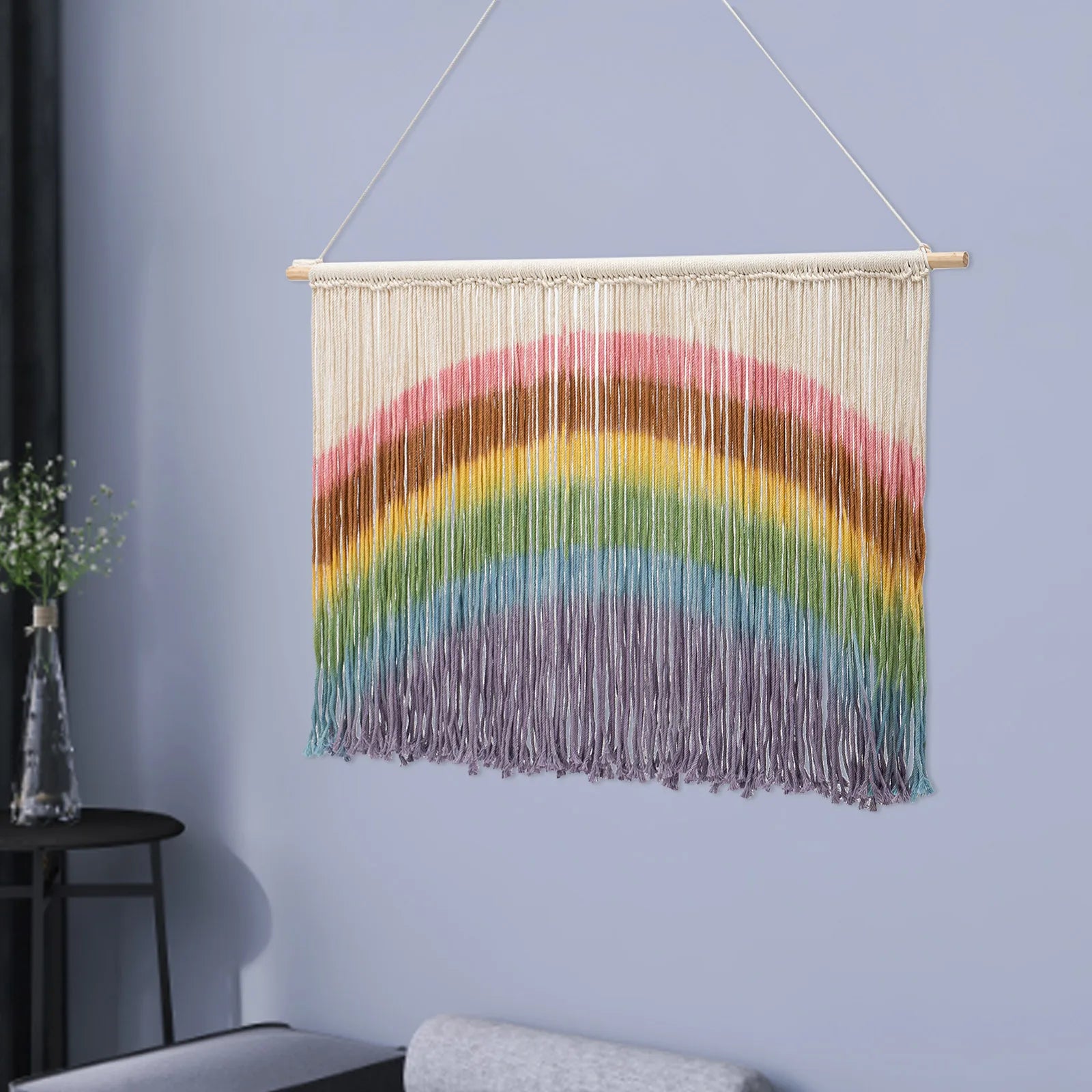Colorful rainbow macrame wall hanging handmade weaving with wooden dowel and cream fringe for wall decor