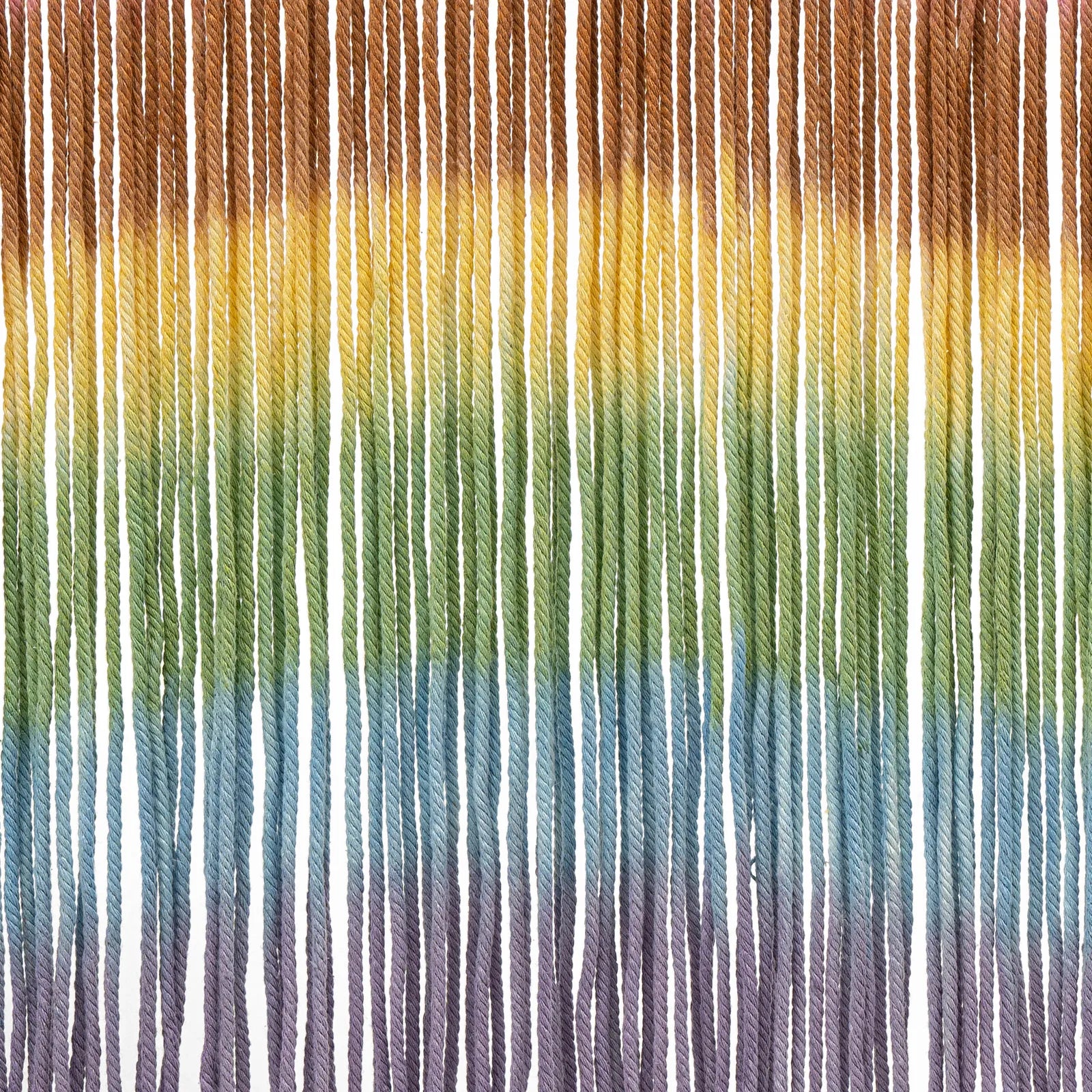 Decorbites handmade weaving wall hanging featuring rainbow-colored twisted yarn in a macrame wall hanging design
