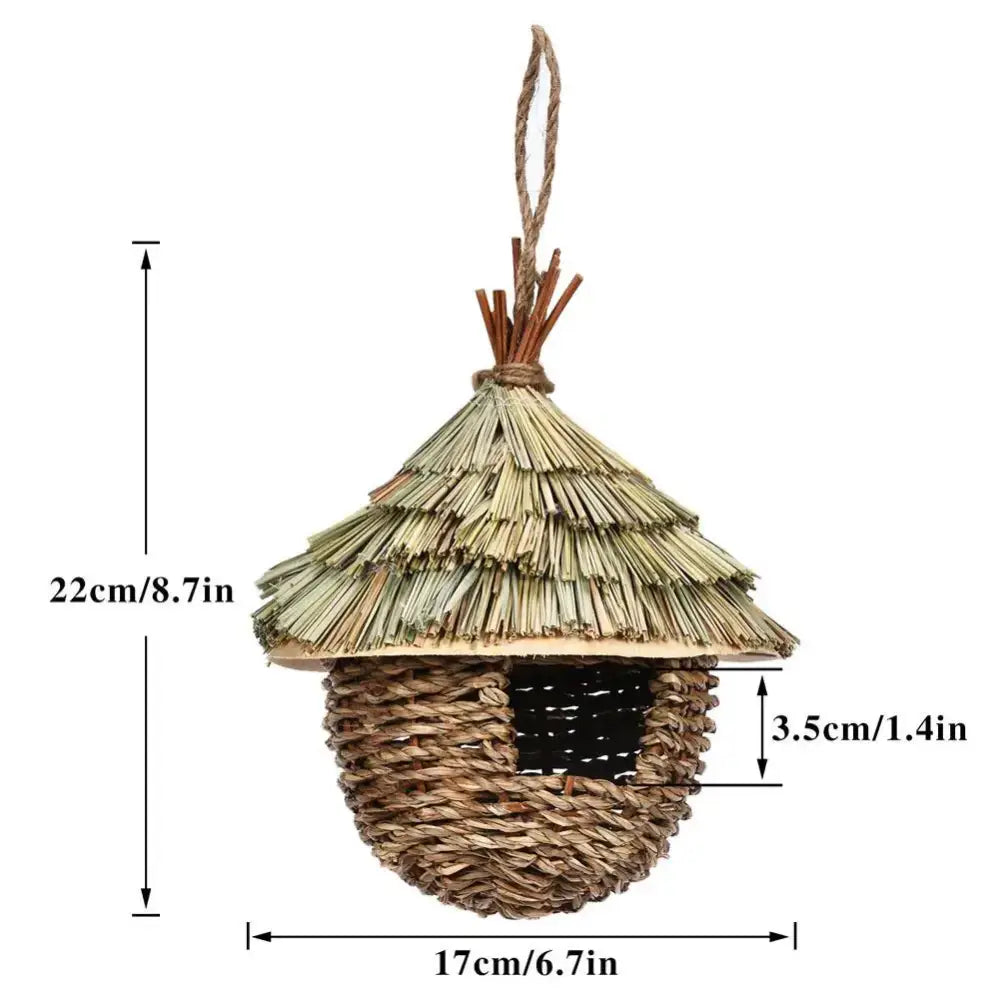 DecorBites™ handwoven straw bird nest with thatched roof and hanging loop for outdoor garden use