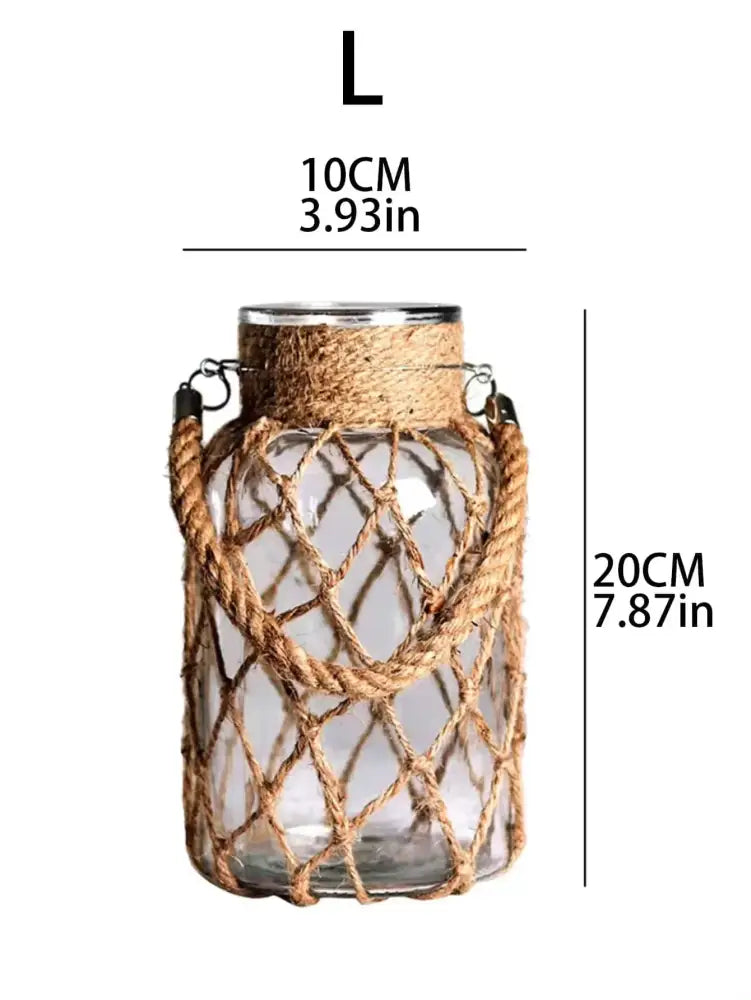 DecorBites hanging glass vase with clear glass, hemp rope netting, metallic rim, and natural rope handles for rustic decor