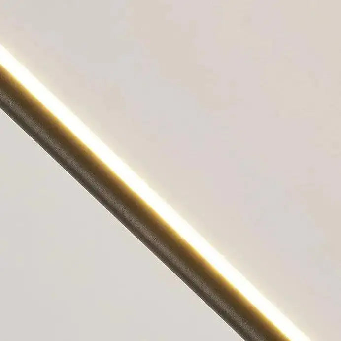 A sleek decorbites™ hanging pendant light with warm led strip glow and metallic casing for bedroom use