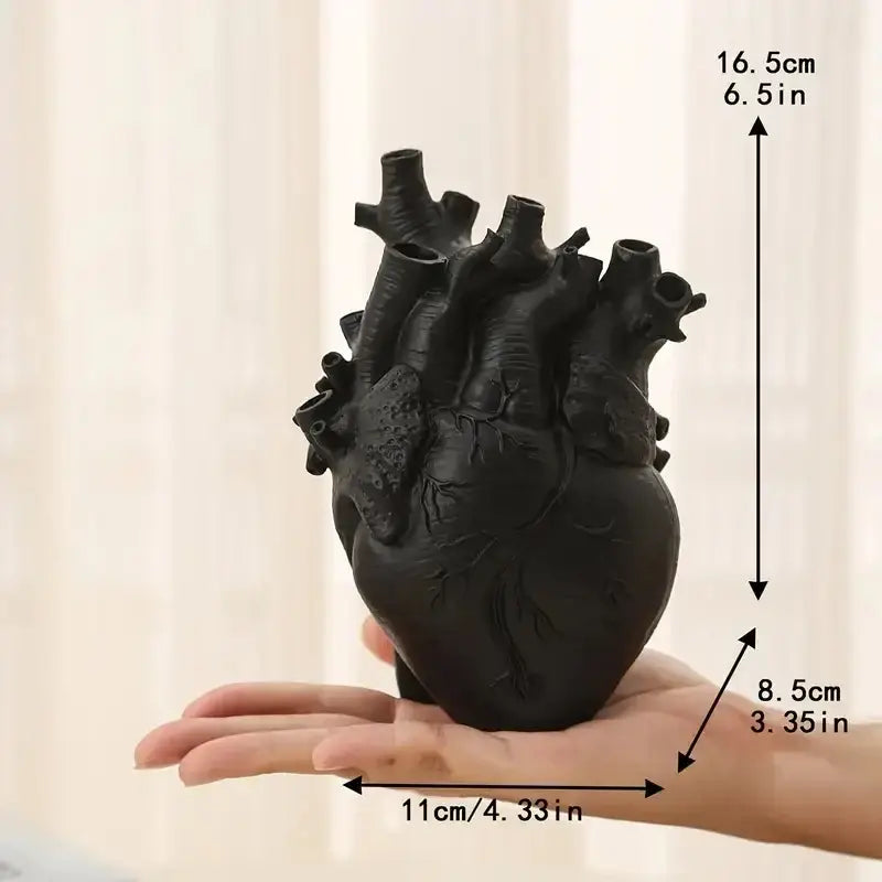 DecorBites™ heart shape resin vase in black matte ceramic with detailed vein and artery textures for decor use