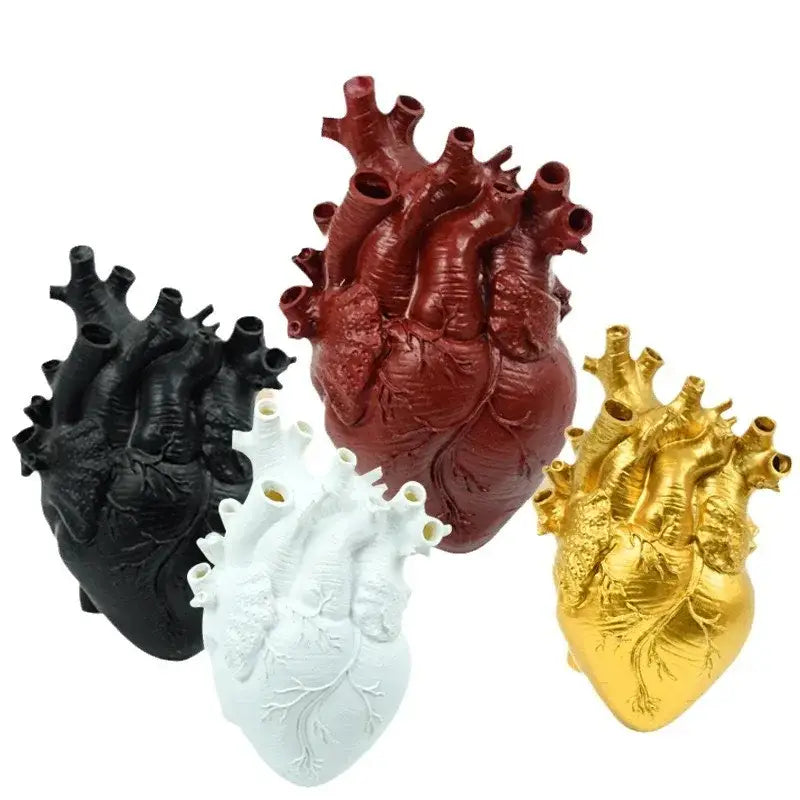 DecorBites heart shape resin vase set with four colors in black red white and gold featuring detailed heart shape design
