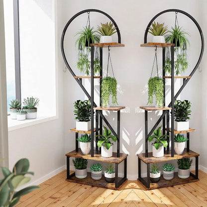 Rustic wooden and black metal DecorBites™ heart shaped plant stand with hooks and multiple tiers for potted plants