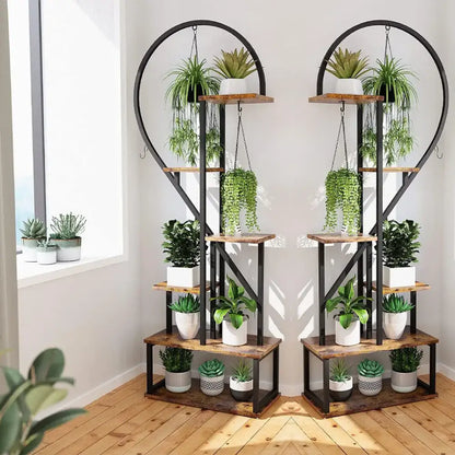 Rustic wooden and black metal DecorBites™ heart shaped plant stand with hooks and multiple tiers for potted plants