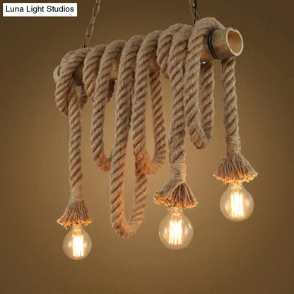 Decorbites hemp rope pendant light with coiled beige rope, bamboo tube accents, and exposed bulb fixtures for industrial island lighting