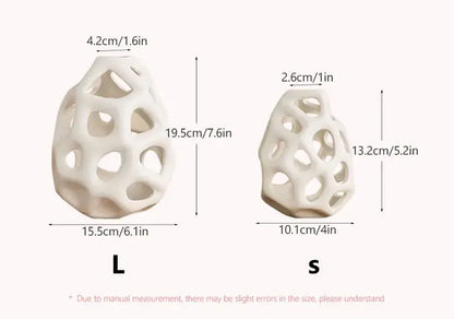 White ceramic vase with geometric lattice design in two sizes featuring nordic classical design by DecorBites