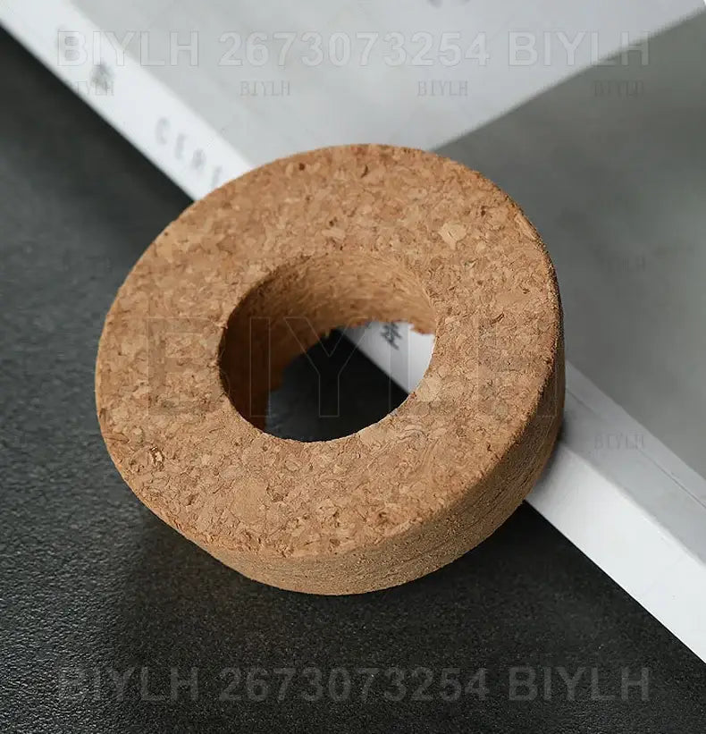 A natural brown cork stopper with a textured porous surface for decorbites™ hydroponic glass flower pots set of 2
