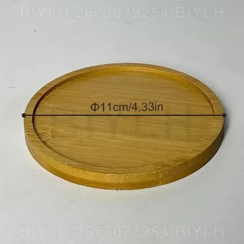 A round light brown bamboo coaster with smooth finish and natural grain pattern for decorbites glass flower pots